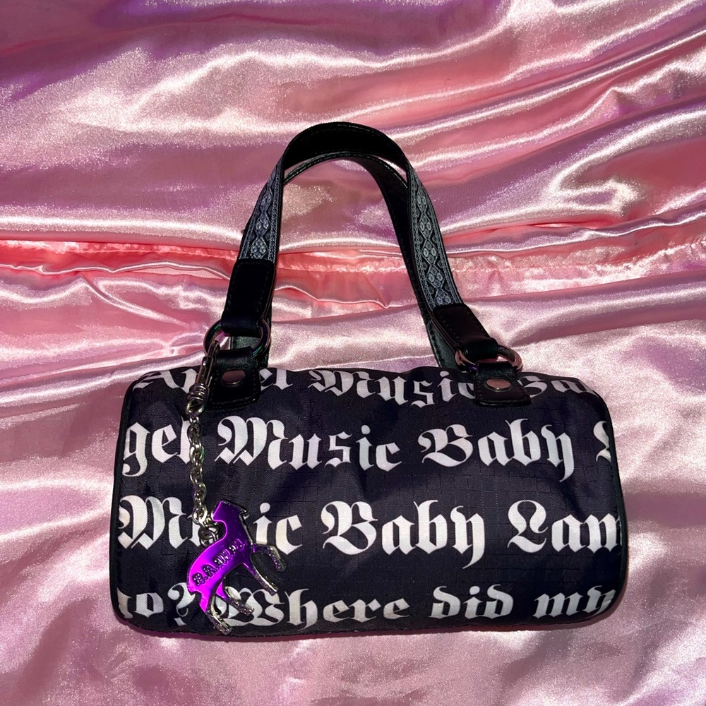 Gwen Stefani L.A.M.B. lesportsac guitar strap 
mini barrel bag